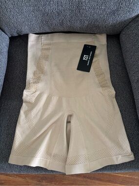Sarin Mathew’s High-Waist Shaping Shorts in Beige